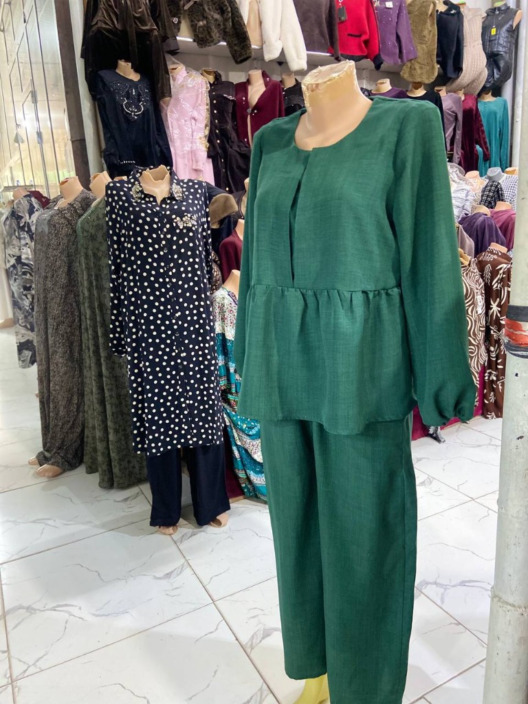 Emerald green tunic and trouser set by Shahzoda